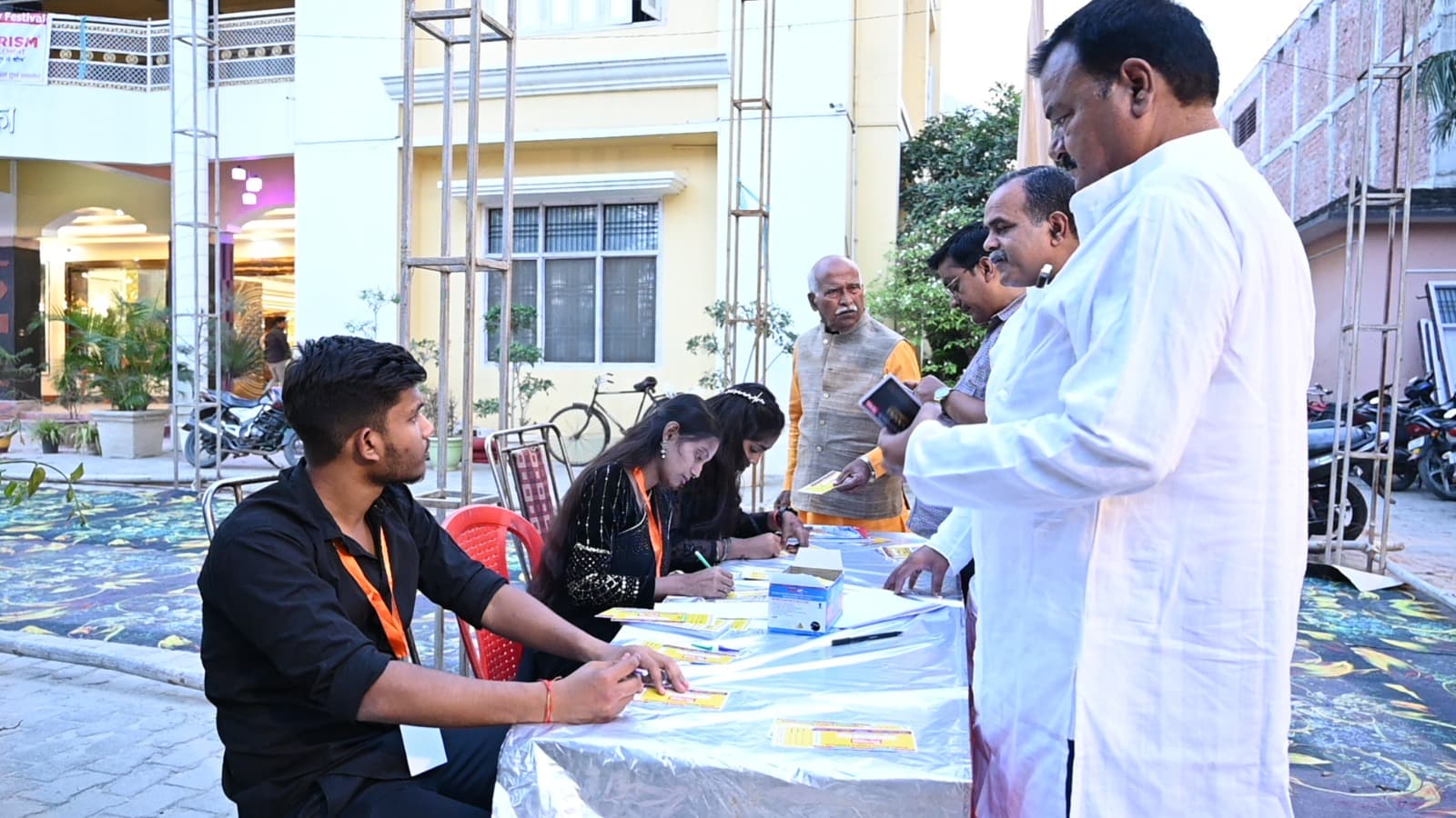 Event team welcoming guests at the registration desk
