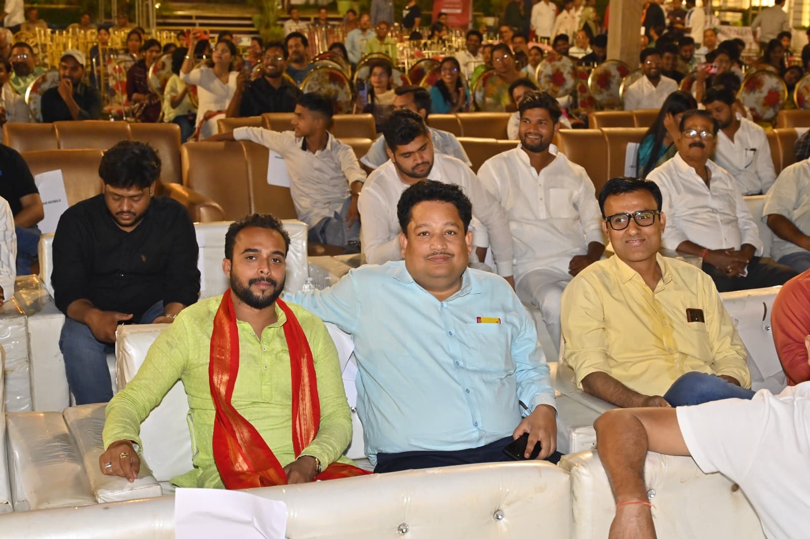 Guests seated together during the poetry programme at Adarsh Vatika
