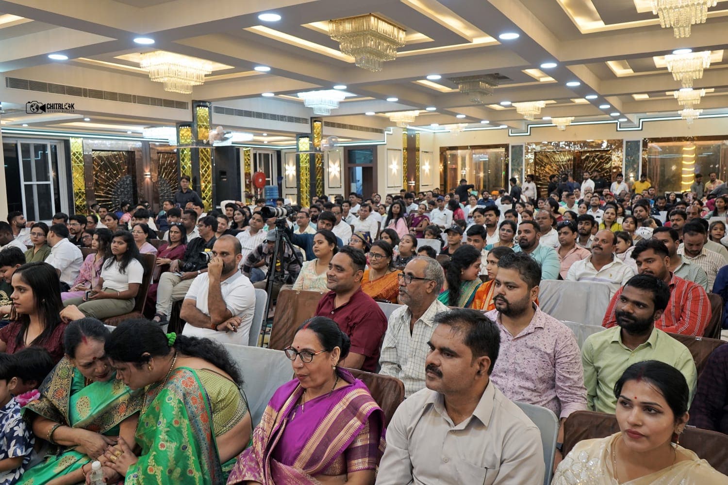 Audience watching a Ballia Beats live concert indoors at Adarsh Vatika