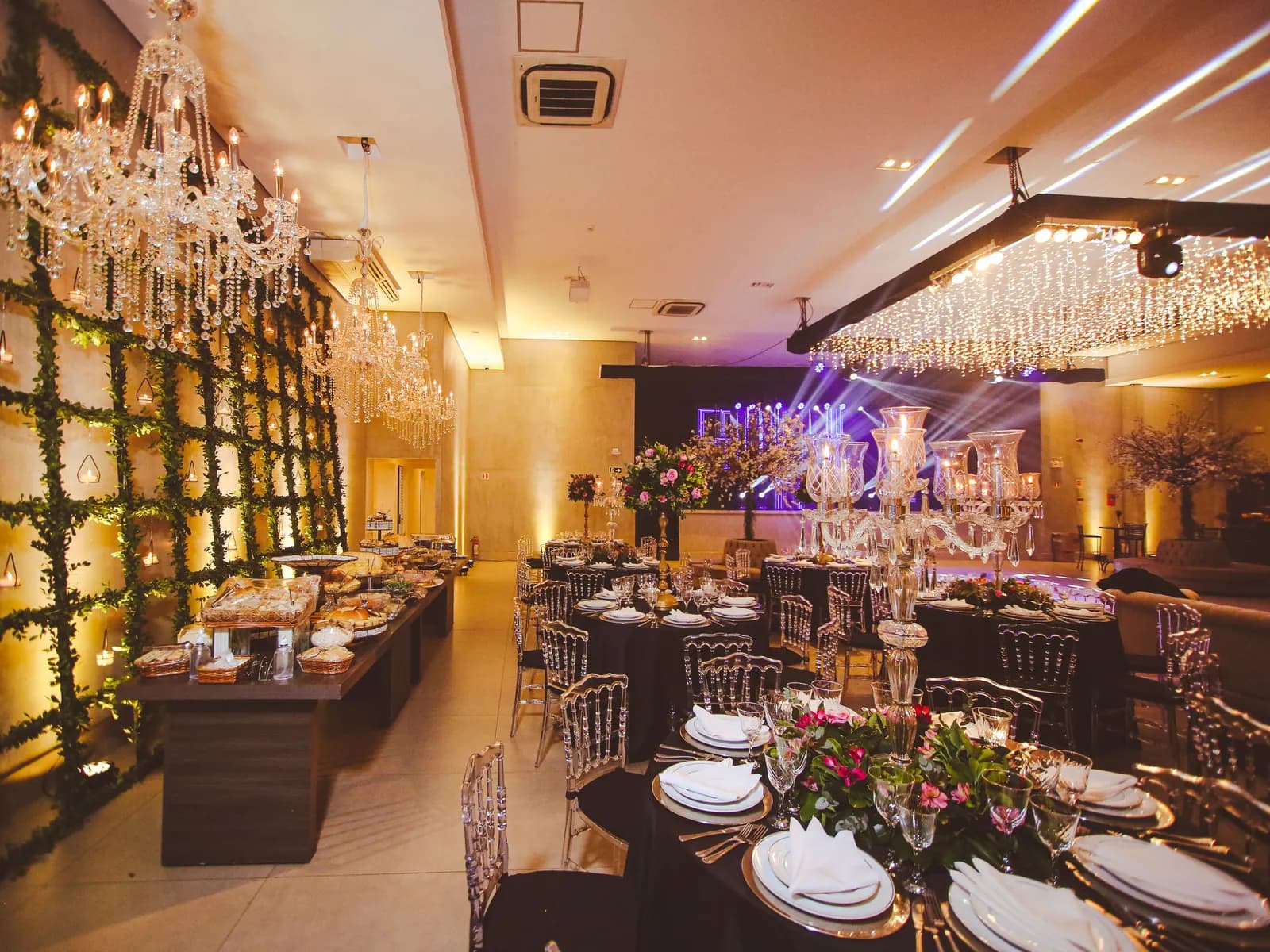 Temporary concept image of chandeliers glowing over a decorated celebration hall; not property photography.